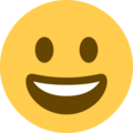 grinning face emoji on twitter  (twemoji)